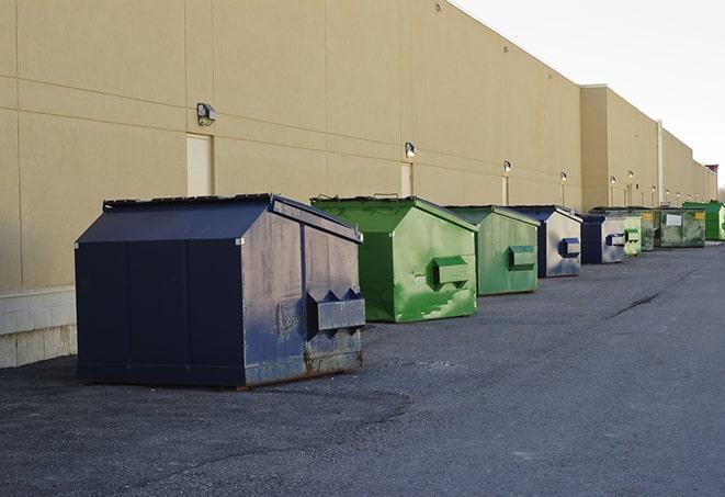 a row of large construction dumpsters on-site in Capistrano Beach CA